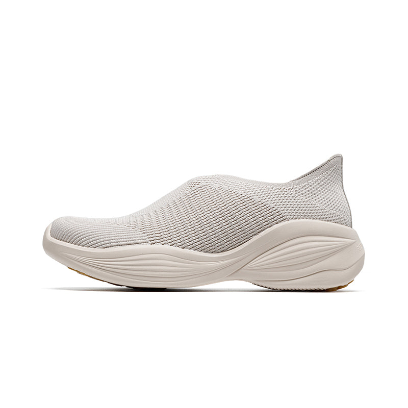 Woman wearing Rebecca Lim's arch support shoes for back pain relief