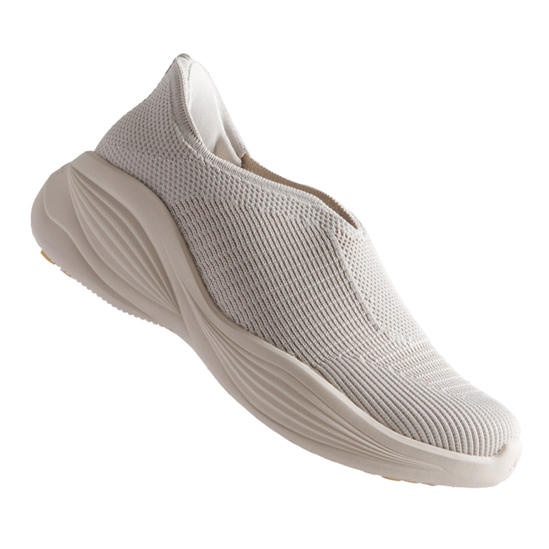 Woman wearing Rebecca Lim's arch support shoes for back pain relief