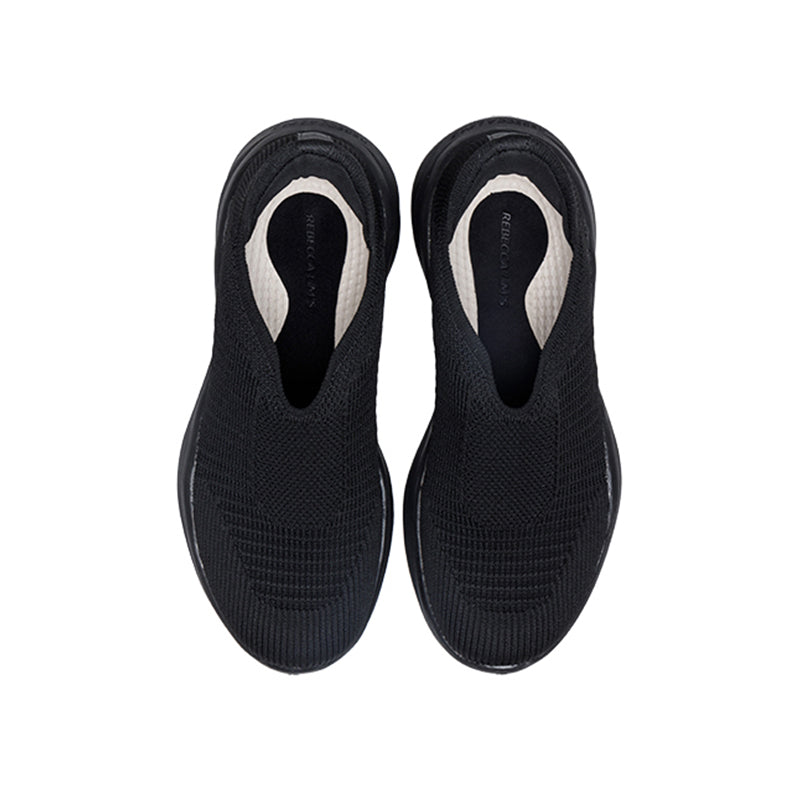 Woman wearing Rebecca Lim's arch support shoes for back pain relief