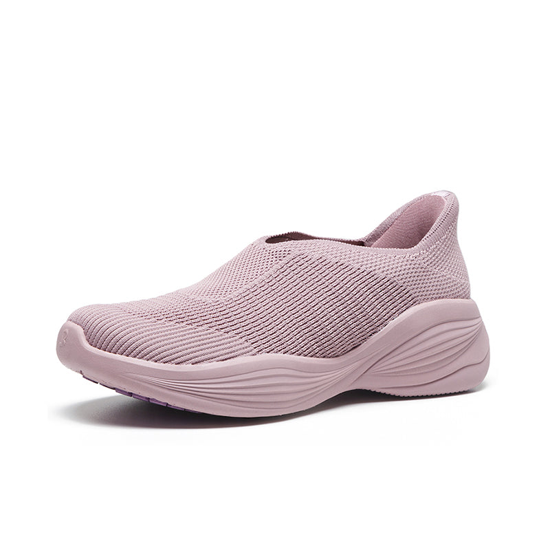 Woman wearing Rebecca Lim's arch support shoes for back pain relief