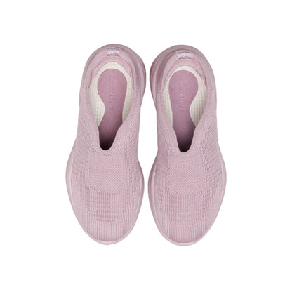 Woman wearing Rebecca Lim's arch support shoes for back pain relief