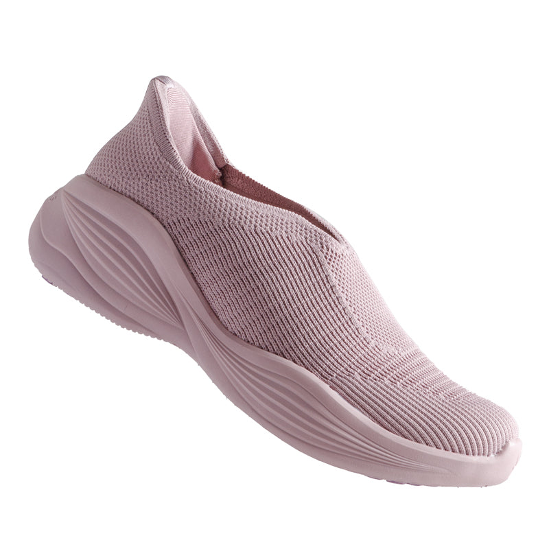 Woman wearing Rebecca Lim's arch support shoes for back pain relief