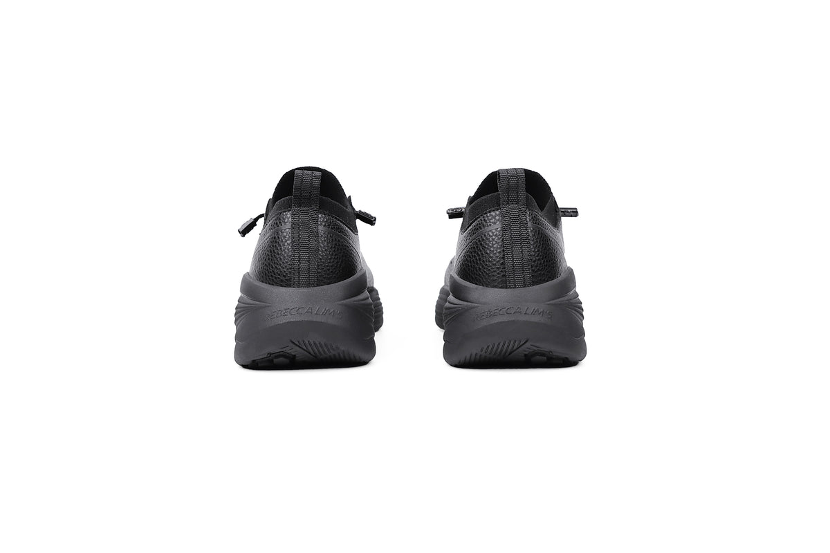 Woman wearing Rebecca Lim's arch support shoes for back pain relief